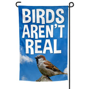 A garden flag with a blue background and a bird graphic, along with the text 'BIRDS ARENT REAL'.